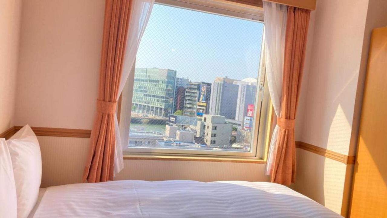 Toyoko Inn Hakata Nishi-Nakasu Фукуока Экстерьер фото